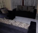 Black sofa with side cusion